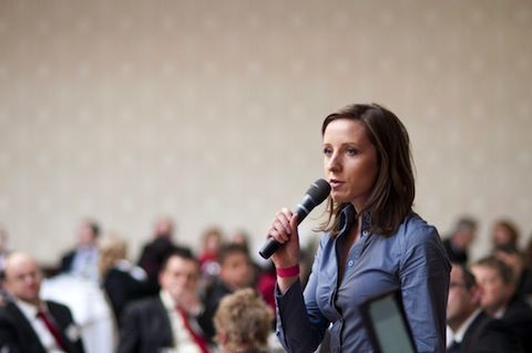 Woman speaking at a conference