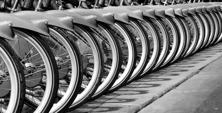 A pinterest image of bicycles in a pattern.