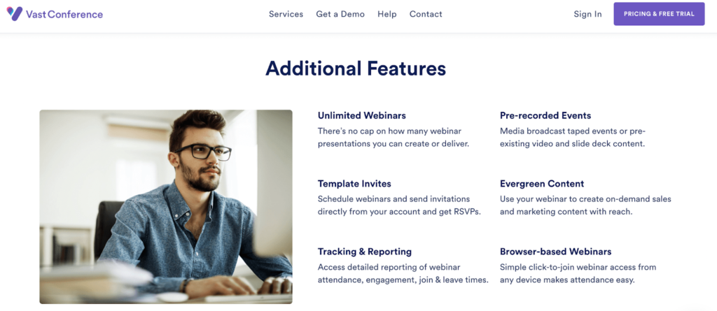 An image showing a person on the computer, along with Vast Conference’s webinar features.