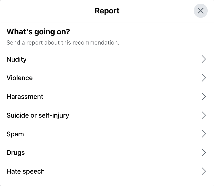Example of Facebook report post screen with options to select reason for report