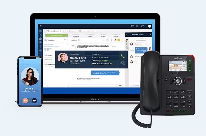A screenshot from Nextiva showing a mobile phone, hardline phone, and a laptop to communicate their mobile device service solutions.