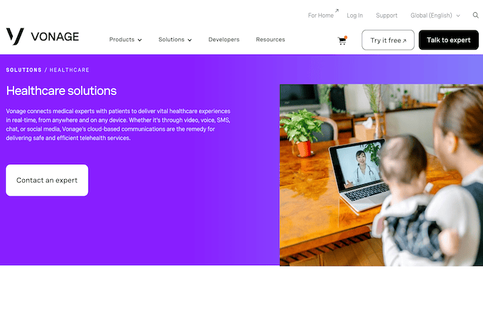 Vonage healthcare solutions landing page with a woman and baby video conferencing with a doctor. 