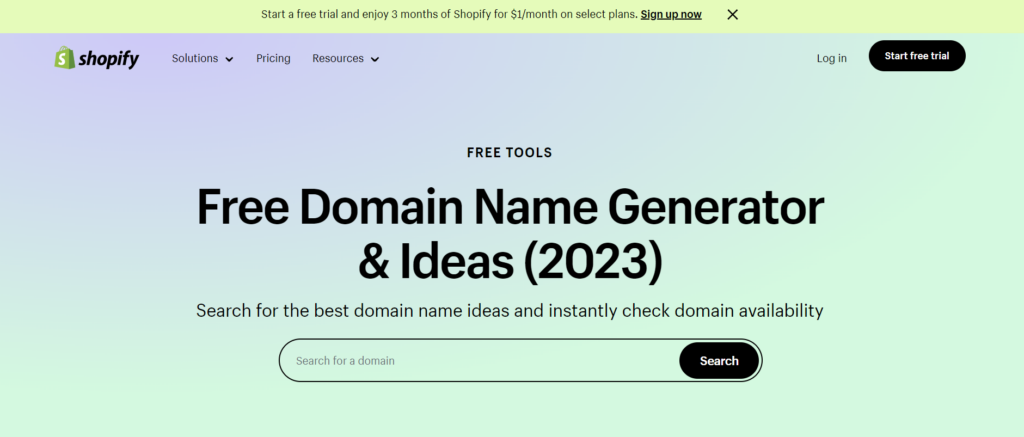 Text against a dark green background that reads “Free Domain Name Generator & Ideas (2022) with a button to search for a domain. Beside the text is an image of a laptop with data on it and a truck, shop, and bicycle behind it.