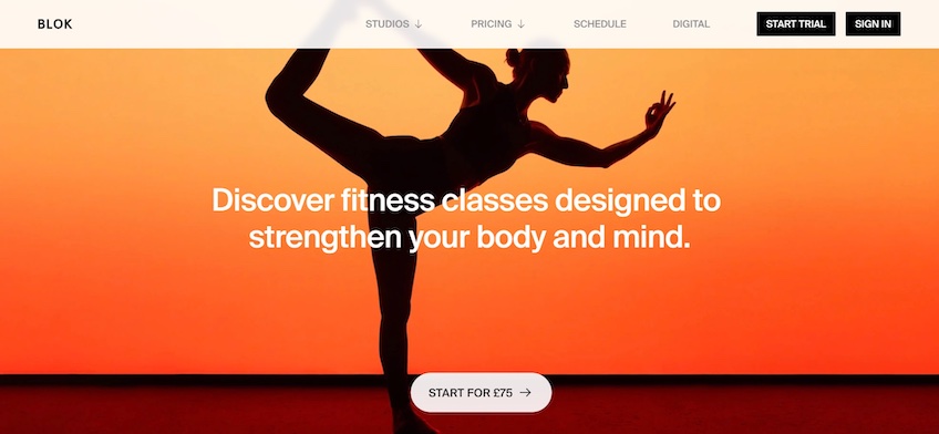 BLOK homepage with a person performing yoga with a bright red and orange background. 