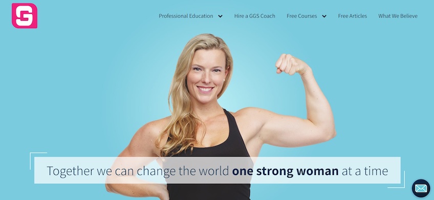 Pagina de pornire a Girls Gone Strong cu o imagine a unei femei care își flexează brațul. 
