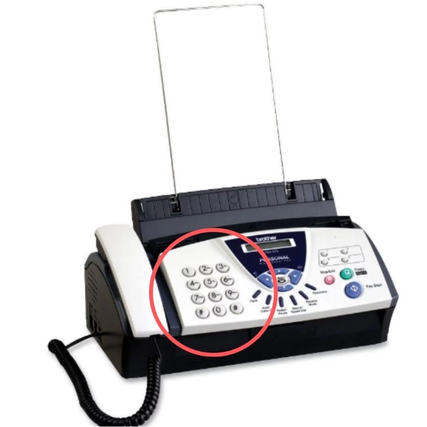 Fax machine with red circle around the numbers key pad.