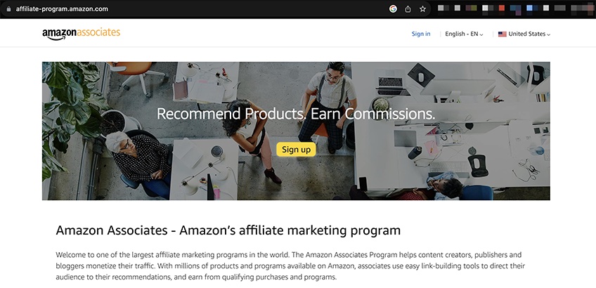 Amazon associates main page with a yellow sign up button. 