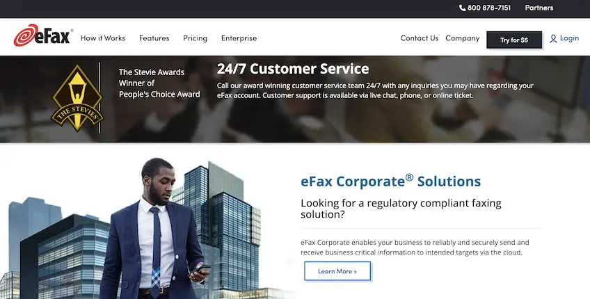 Screenshot from eFax's homepage highlighting its 24/7 customer service and corporate solutions, showing a man in a suit with city buildings in the background