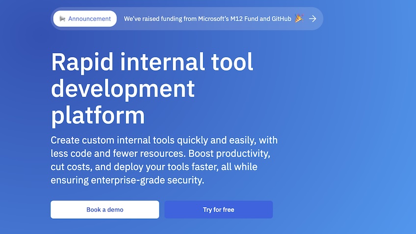 ToolJet homepage with options to book a demo or try for free.